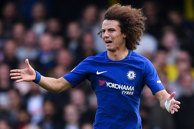 LONDON, ENGLAND - OCTOBER 21:  David Luiz of Chelsea runs with the ball during the Premier League match between Chelsea and Watford at Stamford Bridge on October 21, 2017 in London, England.  (Photo by David Ramos/Getty Images)