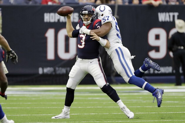 Houston Texans quarterback Tom Savage (3) is hit by Indianapolis Colts inside linebacker Jon Bostic (57) as he tries to throw during the first half of an NFL football game Sunday, Nov. 5, 2017, in Houston. (AP Photo/David J. Phillip)