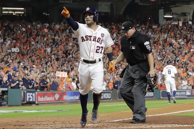 Houston Astros' Jose Altuve celebrates as he crosses home after hitting a home run during the fifth inning of Game 7 of baseball's American League Championship Series against the New York Yankees Saturday, Oct. 21, 2017, in Houston. (AP Photo/David J. Phillip)