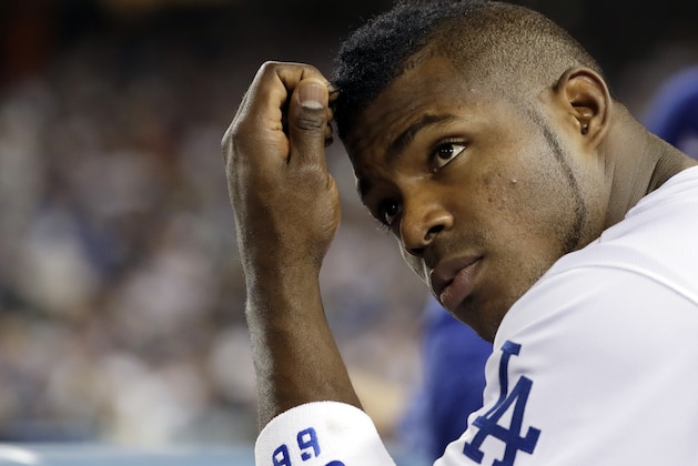 FILE - This Nov. 1, 2017 file photo shows Los Angeles Dodgers outfielder Yasiel Puig during the second inning of Game 7 of baseball's World Series against the Houston Astros in Los Angeles. During the game, which the Dodgers ultimately lost 5-1, burglars broke into Puig's home in the Encino neighborhood of Los Angeles' San Fernando Valley. Police report that officers answered a burglary alarm Wednesday evening and found a smashed window with several items taken. (AP Photo/Matt Slocum, File)