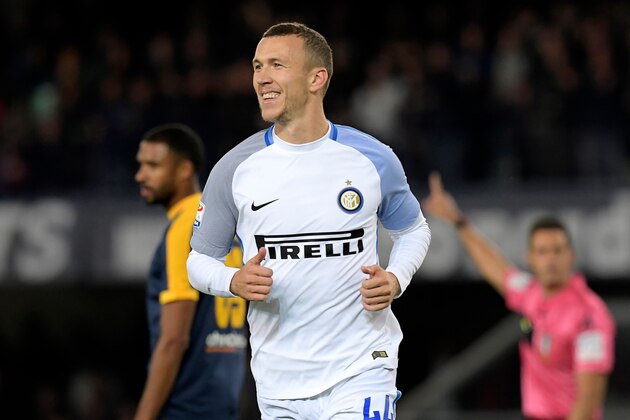 Inter Milan's Croatian forward Ivan Perisic celebrates after scoring his team's second goal during the Italian Serie A football match Hellas Verona FC vs Inter Milan at the Bentegodi stadium in Verona on October 30, 2017. / AFP PHOTO / MIGUEL MEDINA        (Photo credit should read MIGUEL MEDINA/AFP/Getty Images)