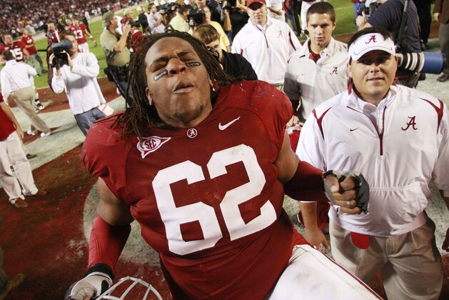 Alabama's Terrence Cody (62) reacts at the end of a 24-15 win over LSU in their NCAA college football game at Bryant Denny Stadium in Tuscaloosa, Ala., Saturday, Nov. 7, 2009. (AP Photo/Dave Martin)