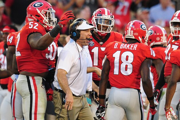 ATHENS, GA - NOVEMBER 4: Head Coach Kirby Smart of the Georgia Bulldogs celebrates with his players late in the game against the South Carolina Gamecocks after the game at Sanford Stadium on November 4, 2017 in Athens, Georgia. (Photo by Scott Cunningham/Getty Images)