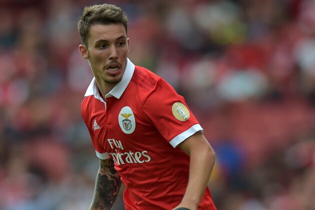 Benfica's Spanish defender Alex Grimaldo runs with the ball during the pre-season friendly football match between RB Leipzig and Benfica at The Emirates Stadium in north London on July 30, 2017, the game is one of four matches played over two days for the Emirates Cup. / AFP PHOTO / OLLY GREENWOOD        (Photo credit should read OLLY GREENWOOD/AFP/Getty Images)
