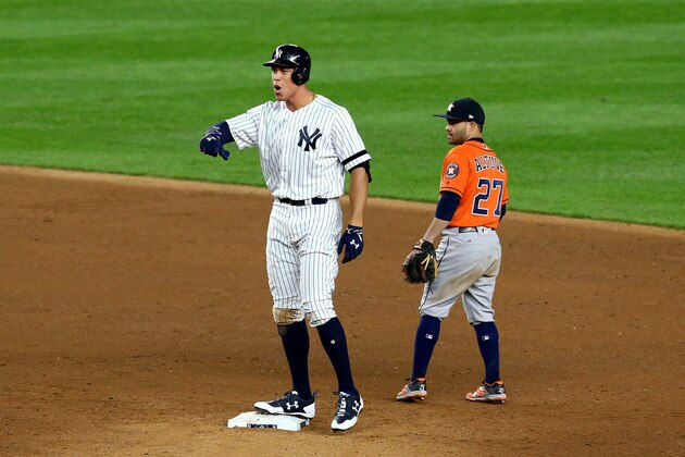 NEW YORK, NY - OCTOBER 17:  Aaron Judge #99 of the New York Yankees reacts after hitting a double during the eighth inning against the Houston Astros in Game Four of the American League Championship Series at Yankee Stadium on October 17, 2017 in the Bronx borough of New York City.  (Photo by Mike Stobe/Getty Images)