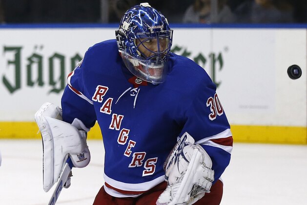New York Rangers goalie Henrik Lundqvist, of Sweden, makes a save against the Nashville Predators in the first period of an NHL hockey game, Saturday, Oct. 21, 2017, in New York. (AP Photo/Adam Hunger)