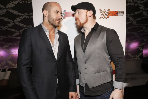 IMAGE DISTRIBUTED FOR 2K - WWE Superstars Cesaro and Sheamus engage in a friendly stare down at the SummerSlam Confidential Panel for the WWE 2K15 roster reveal at Club Nokia, on Saturday, August 16, 2014 in Los Angeles. (Photo by Todd Williamson/Invision for 2K/AP Images)