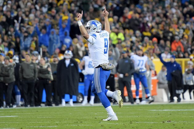 GREEN BAY, WI - NOVEMBER 06:  Matthew Stafford #9 of the Detroit Lions celebrates after scoring a touchdown in the second quarter against the Green Bay Packers at Lambeau Field on November 6, 2017 in Green Bay, Wisconsin. (Photo by Stacy Revere/Getty Images)