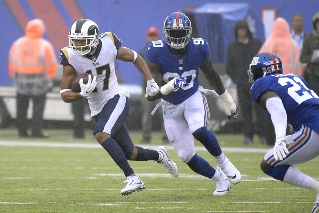 Los Angeles Rams wide receiver Robert Woods (17) breaks away from New York Giants defensive end Jason Pierre-Paul (90) and strong safety Landon Collins (21) during the first half of an NFL football game Sunday, Nov. 5, 2017, in East Rutherford, N.J. (AP Photo/Bill Kostroun)