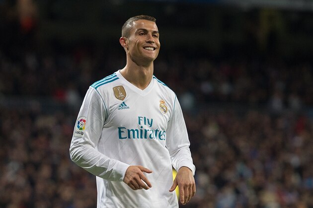 MADRID, SPAIN - NOVEMBER 05:  Cristiano Ronaldo of Real Madrid CF smiles after missing a shot at goal during the La Liga match between Real Madrid and Las Palmas at Estadio Santiago Bernabeu on November 5, 2017 in Madrid, Spain. (Photo by Denis Doyle/Getty Images)