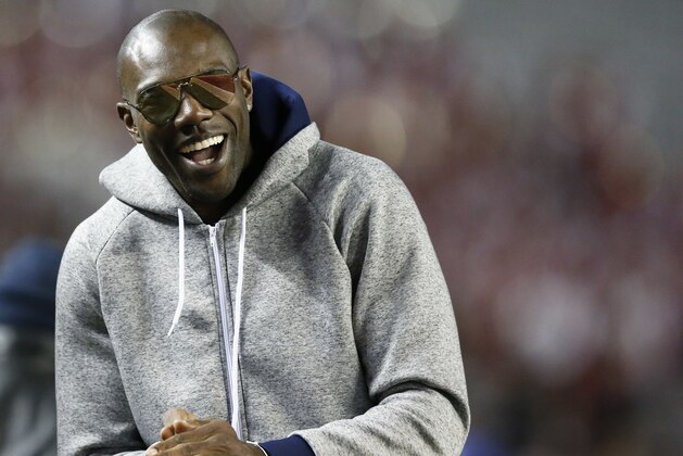 Former NFL wide receiver and Chattanooga alum Terrell Owens walks the sidelines during the second half of an NCAA college football game with Alabama and Chattanooga, Saturday, Nov. 19, 2016, in Tuscaloosa, Ala. (AP Photo/Brynn Anderson) Former NFL wide receiver and Chattanooga alum Terrell Owens walks the sidelines during the second half of an NCAA college football game with Alabama and Chattanooga, Saturday, Nov. 19, 2016, in Tuscaloosa, Ala. (AP Photo/Brynn Anderson)