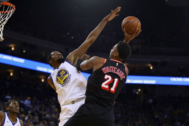 OAKLAND, CA - NOVEMBER 06:  Kevin Durant #35 of the Golden State Warriors blocks a shot taken by Hassan Whiteside #21 of the Miami Heat at ORACLE Arena on November 6, 2017 in Oakland, California. NOTE TO USER: User expressly acknowledges and agrees that, by downloading and or using this photograph, User is consenting to the terms and conditions of the Getty Images License Agreement.  (Photo by Ezra Shaw/Getty Images)