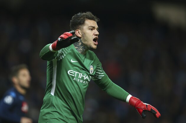 Manchester City goalkeeper Ederson celebrates after saving a penalty kick during the Champions League group F soccer match between Manchester City and Napoli at the Etihad Stadium in Manchester, England, Tuesday, Oct.17, 2017. (AP Photo/Dave Thompson)