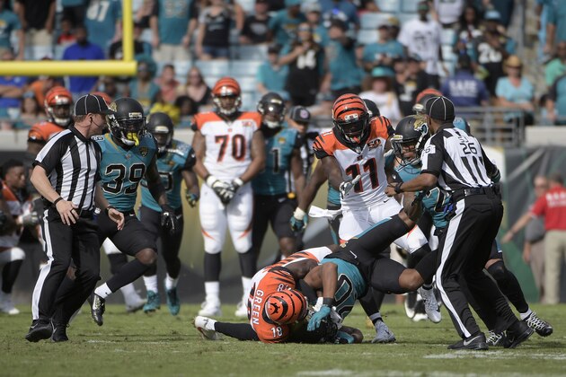 Cincinnati Bengals wide receiver A.J. Green (18) takes down Jacksonville Jaguars cornerback Jalen Ramsey (20) during a fight in the first half of an NFL football game Sunday, Nov. 5, 2017, in Jacksonville, Fla. (AP Photo/Phelan M. Ebenhack) Cincinnati Bengals wide receiver A.J. Green (18) takes down Jacksonville Jaguars cornerback Jalen Ramsey (20) during a fight in the first half of an NFL football game Sunday, Nov. 5, 2017, in Jacksonville, Fla. (AP Photo/Phelan M. Ebenhack)