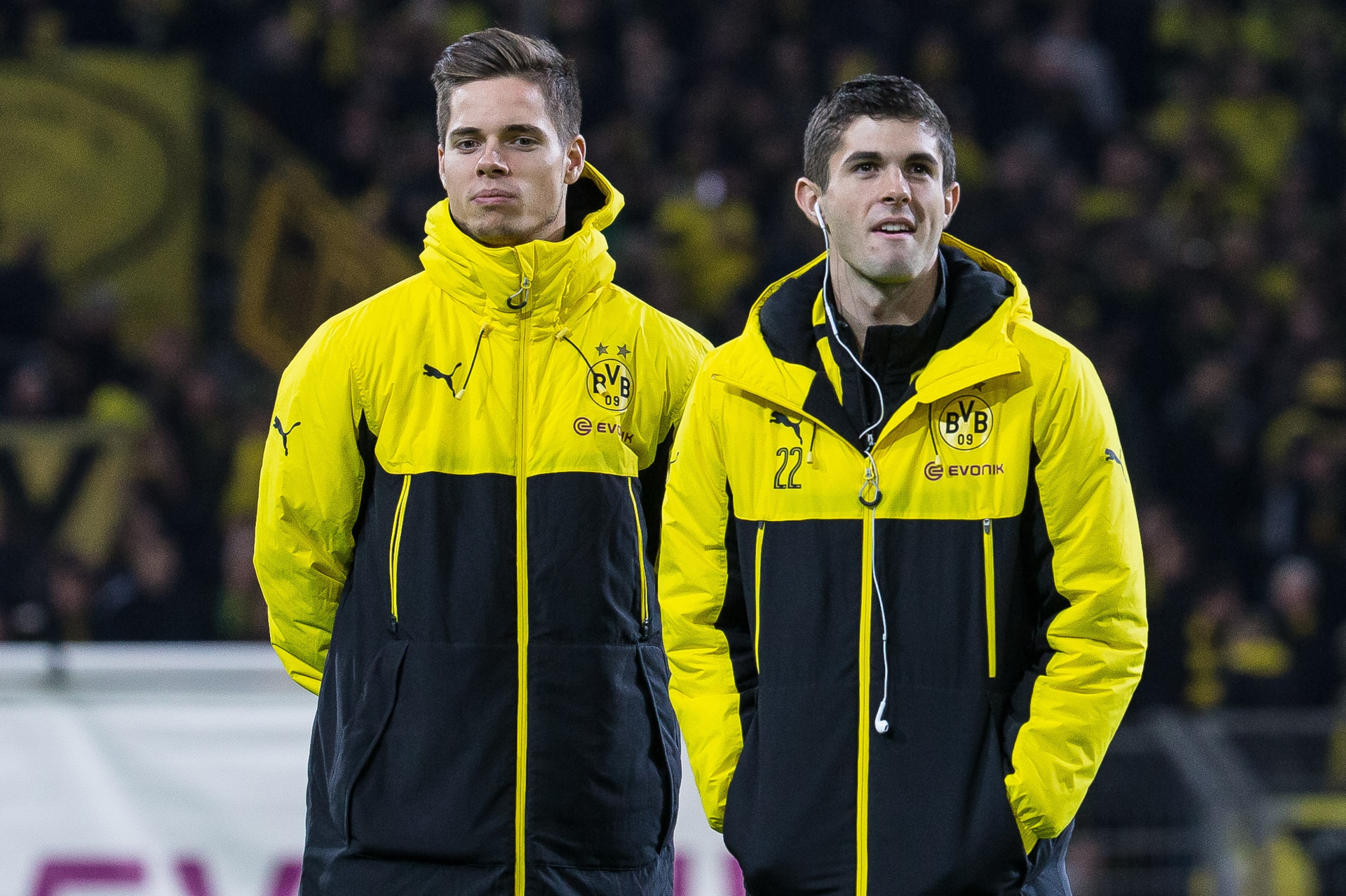 Dortmund, GERMANY - NOVEMBER 19: Julian Weigl of Borussia Dortmund Christian Pulisic of Borussia Dortmund looks on before the Bandesliga soccer match between BV Borussia Dortmund and FC Bayern Muenchen at the Signal Iduna Park in Dortmund, Germany on November 19, 2016. (Photo by TF-Images/Getty Images)
