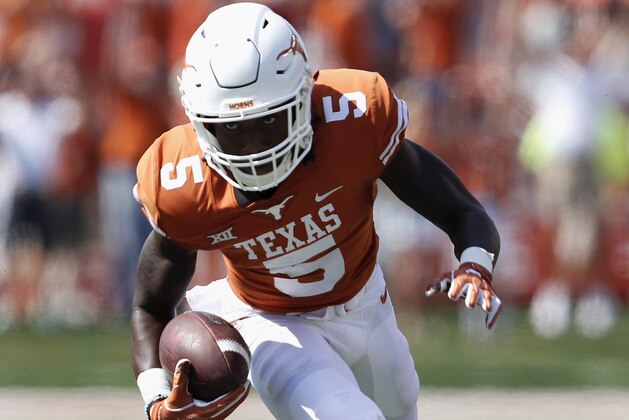 AUSTIN, TX - SEPTEMBER 02:  Holton Hill #5 of the Texas Longhorns intercepts a pass and returns it for a touchdown in the first quarter against the Maryland Terrapins at Darrell K Royal-Texas Memorial Stadium on September 2, 2017 in Austin, Texas.  (Photo by Tim Warner/Getty Images)