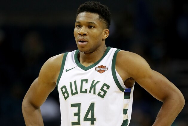 CHARLOTTE, NC - NOVEMBER 01:  Giannis Antetokounmpo #34 of the Milwaukee Bucks watches on against the Charlotte Hornets during their game at Spectrum Center on November 1, 2017 in Charlotte, North Carolina.  NOTE TO USER: User expressly acknowledges and agrees that, by downloading and or using this photograph, User is consenting to the terms and conditions of the Getty Images License Agreement.  (Photo by Streeter Lecka/Getty Images)
