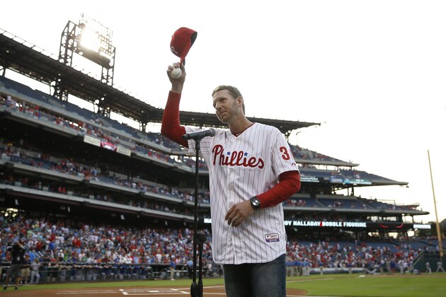 Former Philadelphia Phillies' Roy Halladay acknowledges the crowd before a baseball game against the New York Mets, Friday, Aug. 8, 2014, in Philadelphia. (AP Photo/Matt Slocum)