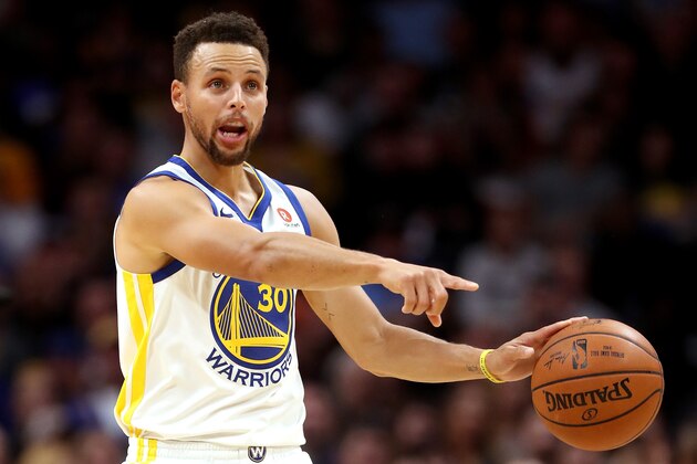 DENVER, CO - NOVEMBER 04:  Stephen Curry #30 of the Golden State Warriors brings the ball down the court against the Denver Nugget at the Pepsi Center on November 4, 2017 in Denver, Colorado. NOTE TO USER: User expressly acknowledges and agrees that, by downloading and or using this photograph, User is consenting to the terms and conditions of the Getty Images License Agreement.  (Photo by Matthew Stockman/Getty Images)