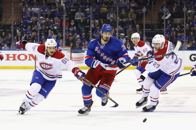 NEW YORK, NY - APRIL 16: Chris Kreider #20 of the New York Rangers skates away from Andrew Shaw #65 and Alex Galchenyuk #27 of the Montreal Canadiens in Game Three of the Eastern Conference First Round during the 2017 NHL Stanley Cup Playoffs at Madison Square Garden on April 16, 2017 in New York City.  (Photo by Bruce Bennett/Getty Images)