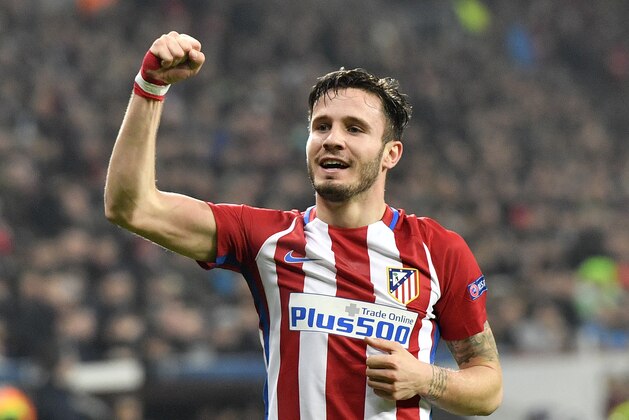 Atletico's Saul Niguez celebrates after scoring the opening goal during the Champions League round of 16 first leg soccer match between Bayer Leverkusen and Atletico Madrid in Leverkusen, Germany, Tuesday, Feb. 21, 2017. (AP Photo/Martin Meissner)
