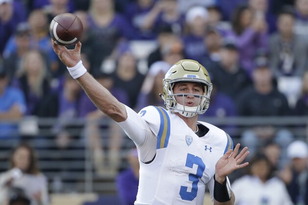 UCLA quarterback Josh Rosen throws against Washington in the first half of an NCAA college football game Saturday, Oct. 28, 2017, in Seattle. (AP Photo/Elaine Thompson)