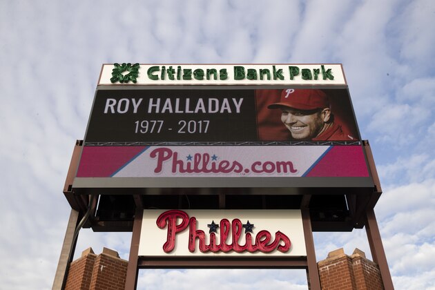 A sign outside Citizens Bank Park displays a message of remembrance of former Phillies pitcher Roy Halladay in Philadelphia, Wednesday, Nov. 8, 2017. Halladay, a two-time Cy Young Award winner who pitched a perfect game and a playoff no-hitter for the Phillies, died Tuesday when his private plane crashed into the Gulf of Mexico. He was 40. (AP Photo/Matt Rourke)