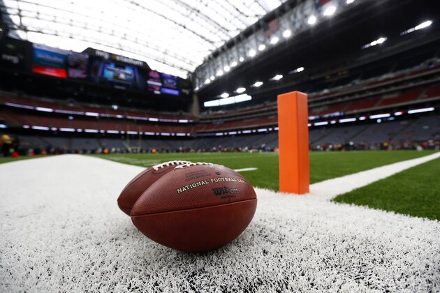 Footballs sit by an end zone pylon before an NFL football game between the Cleveland Browns and Houston Texans on Sunday, Oct. 15, 2017, in Houston. (AP Photo/Eric Gay)