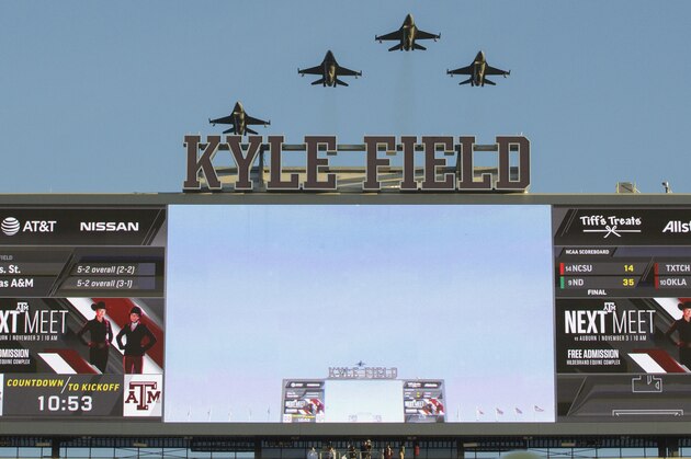 A squadron of F16's fly over Kyle Field before the start of an NCAA college football game between Mississippi State and Texas A&M on Saturday, Oct. 28, 2017, in College Station, Texas. (AP Photo/Sam Craft)
