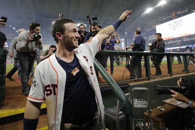 Houston Astros' Alex Bregman celebrates after hitting in the game-winning run during the 10th inning of Game 5 of baseball's World Series against the Los Angeles Dodgers Monday, Oct. 30, 2017, in Houston. The Astros won 13-12 to take a 3-2 lead in the series. (AP Photo/David J. Phillip)
