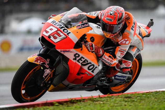 Repsol Honda's Spanish rider Marc Marquez competes during the Malaysia MotoGP at the Sepang International Circuit in Sepang on October 29, 2017.  / AFP PHOTO / MOHD RASFAN        (Photo credit should read MOHD RASFAN/AFP/Getty Images)