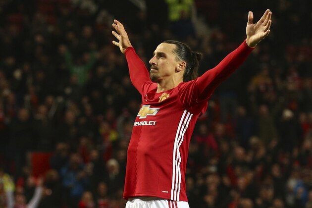 Manchester United's Zlatan Ibrahimovic celebrates after scoring his sides 4th goal and his second of the game during the English League Cup quarterfinal soccer match between Manchester United and West Ham United at Old Trafford in Manchester, England Wednesday, Nov. 30, 2016. Man. United won the match 4-1.(AP Photo/Dave Thompson)