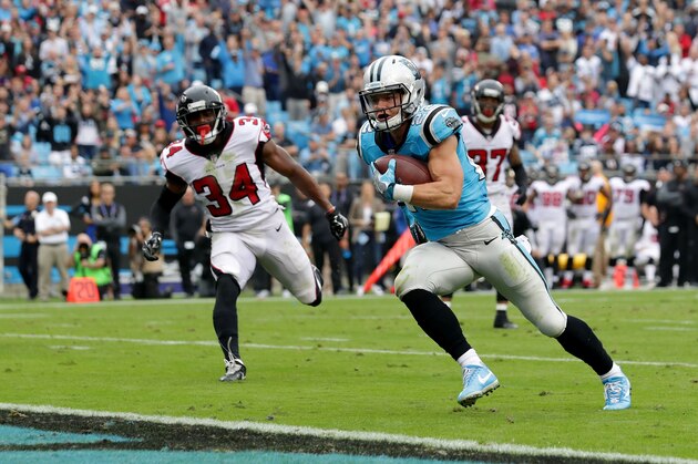 CHARLOTTE, NC - NOVEMBER 05: Christian McCaffrey #22 of the Carolina Panthers runs for a touchdown against the Atlanta Falcons in the second quarter during their game at Bank of America Stadium on November 5, 2017 in Charlotte, North Carolina.  (Photo by Streeter Lecka/Getty Images)