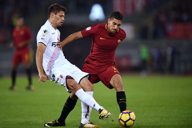 Roma's midfielder Lorenzo Pellegrini (R) vies with Bologna Hungarian midfielder Adam Nagy during the Italian Serie A football match Roma vs Bologna on October 28, 2017 at the Olympic Stadium in Rome.  / AFP PHOTO / FILIPPO MONTEFORTE        (Photo credit should read FILIPPO MONTEFORTE/AFP/Getty Images)
