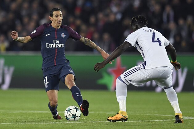 Paris Saint-Germain's Argentinian forward Angel Di Maria (L) vies for the ball with Anderlecht's Senegalese defender Serigne Mbodji  during the UEFA Champions League Group B football match between Paris Saint-Germain (PSG) and Anderlecht (RSCA) on October 31, 2017, at the Parc des Princes stadium in Paris. / AFP PHOTO / CHRISTOPHE SIMON        (Photo credit should read CHRISTOPHE SIMON/AFP/Getty Images)