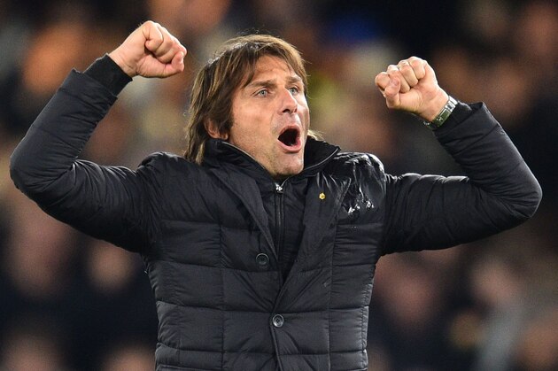 Chelsea's Italian head coach Antonio Conte celebrates on the pitch after the English Premier League football match between Chelsea and Manchester United at Stamford Bridge in London on November 5, 2017.
Chelsea won the game 1-0. / AFP PHOTO / Glyn KIRK / RESTRICTED TO EDITORIAL USE. No use with unauthorized audio, video, data, fixture lists, club/league logos or 'live' services. Online in-match use limited to 75 images, no video emulation. No use in betting, games or single club/league/player publications.  /         (Photo credit should read GLYN KIRK/AFP/Getty Images)