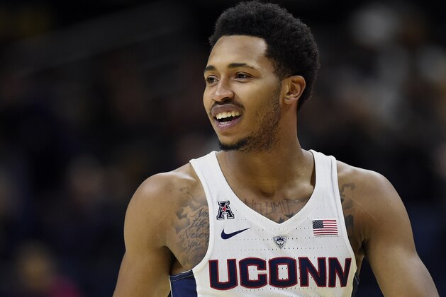 Connecticut's Jalen Adams in the first half of an NCAA college exhibition basketball game, Sunday, Nov. 5, 2017, in Storrs, Conn. (AP Photo/Jessica Hill)