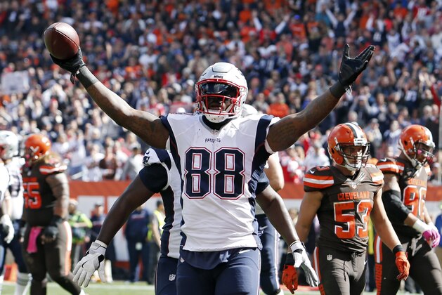 New England Patriots tight end Martellus Bennett celebrates a touchdown catch against the Cleveland Browns in the first half of an NFL football game Sunday, Oct. 9, 2016, in Cleveland. (AP Photo/Ron Schwane)