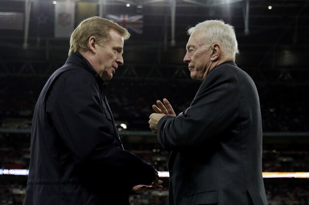 FILE - In this Nov. 9, 2014, file photo, NFL commissioner Roger Goodell, left, and Dallas Cowboys owner Jerry Jones talk during an NFL football game between the Jacksonville Jaguars and Dallas Cowboys at Wembley Stadium in London. For all of the public (and players' association) angst regarding Goodell, who enters his second decade in charge on Thursday, Sept. 1, 2016, he couldn't be held in higher esteem by most of the 32 team owners _ his bosses.