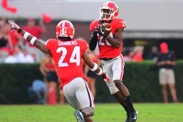 ATHENS, GA - NOVEMBER 4: J. R. Reed #20 of the Georgia Bulldogs intercepts a pass against the South Carolina Gamecocks at Sanford Stadium on November 4, 2017 in Athens, Georgia. (Photo by Scott Cunningham/Getty Images)