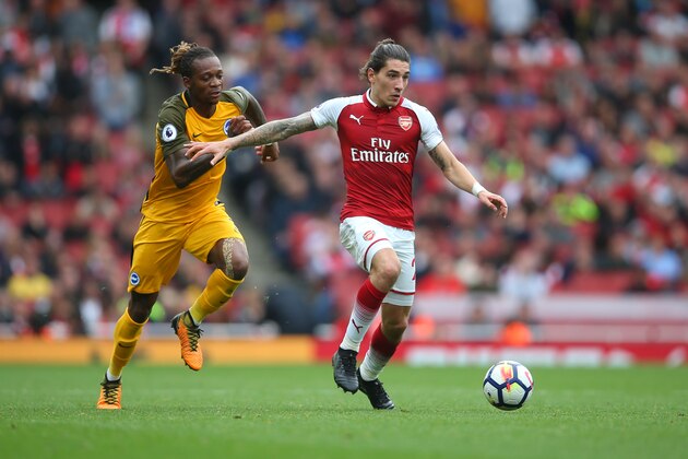 LONDON, ENGLAND - OCTOBER 01: Gaetan Bong of Brighton and Hove Albion and Hector Bellerin of Arsenal during the Premier League match between Arsenal and Brighton and Hove Albion at Emirates Stadium on October 1, 2017 in London, England. (Photo by Catherine Ivill - AMA/Getty Images) LONDON, ENGLAND - OCTOBER 01: Gaetan Bong of Brighton and Hove Albion and Hector Bellerin of Arsenal during the Premier League match between Arsenal and Brighton and Hove Albion at Emirates Stadium on October 1, 2017 in London, England. (Photo by Catherine Ivill - AMA/Getty Images)
