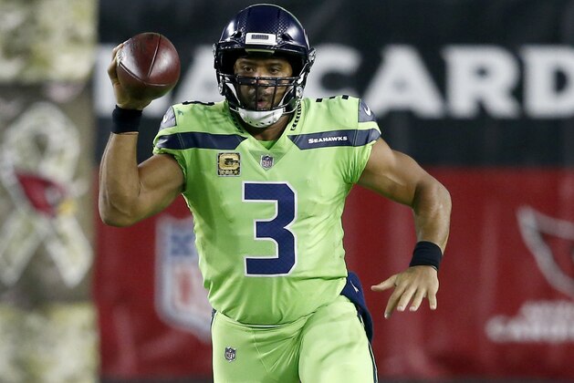Seattle Seahawks quarterback Russell Wilson (3) scrambles against the Arizona Cardinals during the first half of an NFL football game, Thursday, Nov. 9, 2017, in Glendale, Ariz. (AP Photo/Ross D. Franklin)