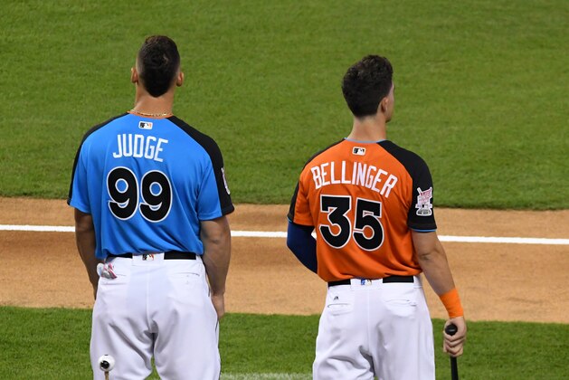 MIAMI, FL - JULY 10:  American League All-Star Aaron Judge #99 of the New York Yankees and National League All-Star Cody Bellinger #35 of the Los Angeles Dodgers stand together during the T-Mobile Home Run Derby at Marlins Park on July 10, 2017 in Miami, Florida.  (Photo by Mark Cunningham/MLB Photos via Getty Images)