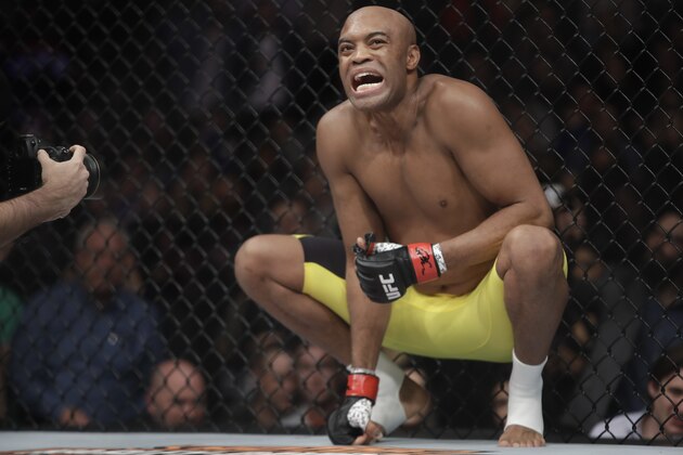 Anderson Silva, of Brazil, squats before a middleweight  mixed martial arts bout against Derek Brunson at UFC 208 Saturday, Feb. 11, 2017, in New York.  Silva won the fight. (AP Photo/Frank Franklin II)