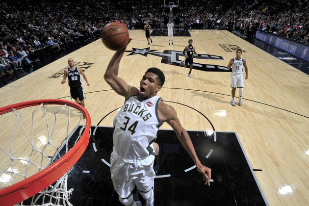 SAN ANTONIO, TX - NOVEMBER 10:  Giannis Antetokounmpo #34 of the Milwaukee Bucks dunks the ball against the San Antonio Spurs on November 10, 2017 at the AT&T Center in San Antonio, Texas. NOTE TO USER: User expressly acknowledges and agrees that, by downloading and or using this photograph, user is consenting to the terms and conditions of the Getty Images License Agreement. Mandatory Copyright Notice: Copyright 2017 NBAE (Photos by Mark Sobhani/NBAE via Getty Images)