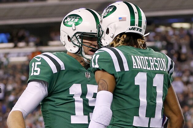 New York Jets quarterback Josh McCown (15) and wide receiver Robby Anderson (11) celebrate after connecting on a touchdown pass against the Buffalo Bills during the second half of an NFL football game, Thursday, Nov. 2, 2017, in East Rutherford, N.J. (AP Photo/Kathy Willens)