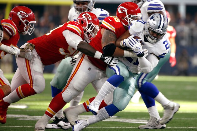 ARLINGTON, TX - NOVEMBER 05:  Roy Miller #98 of the Kansas City Chiefs tackles Ezekiel Elliott #21 of the Dallas Cowboys in the second quarter of a football game at AT&T Stadium on November 5, 2017 in Arlington, Texas.  (Photo by Ron Jenkins/Getty Images)