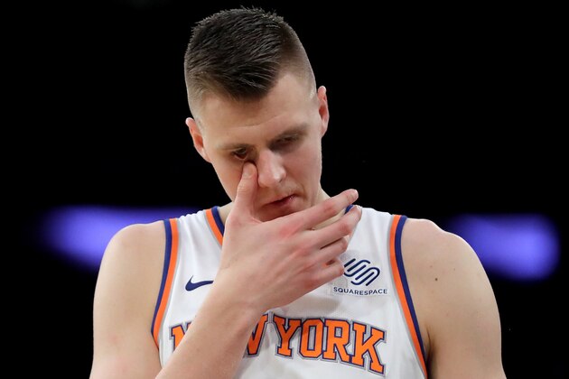 NEW YORK, NY - NOVEMBER 07:  Kristaps Porzingis #6 of the New York Knicks reacts late in the fourth quarter against the Charlotte Hornets during their game at Madison Square Garden on November 7, 2017 in New York City. NOTE TO USER: User expressly acknowledges and agrees that, by downloading and or using this photograph, User is consenting to the terms and conditions of the Getty Images License Agreement.  (Photo by Abbie Parr/Getty Images)