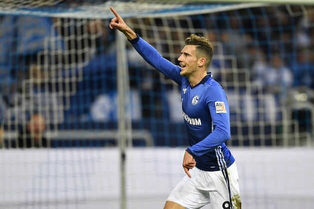 Schalke's Leon Goretzka celebrates after he scored the opening goal during the German Bundesliga soccer match between FC Schalke 04 and FSV Mainz 05 at the Arena in Gelsenkirchen, Germany, Friday, Oct. 20, 2017. (AP Photo/Martin Meissner)
