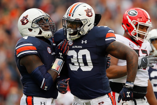 AUBURN, AL - NOVEMBER 11:  Tre' Williams #30 of the Auburn Tigers reacts after a defensive stop against the Georgia Bulldogs with Jeff Holland #4 at Jordan Hare Stadium on November 11, 2017 in Auburn, Alabama.  (Photo by Kevin C. Cox/Getty Images)